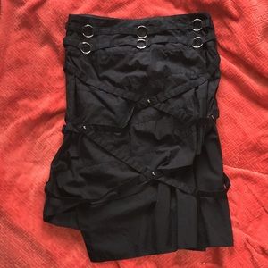 Mid length skirt with metal detailing
